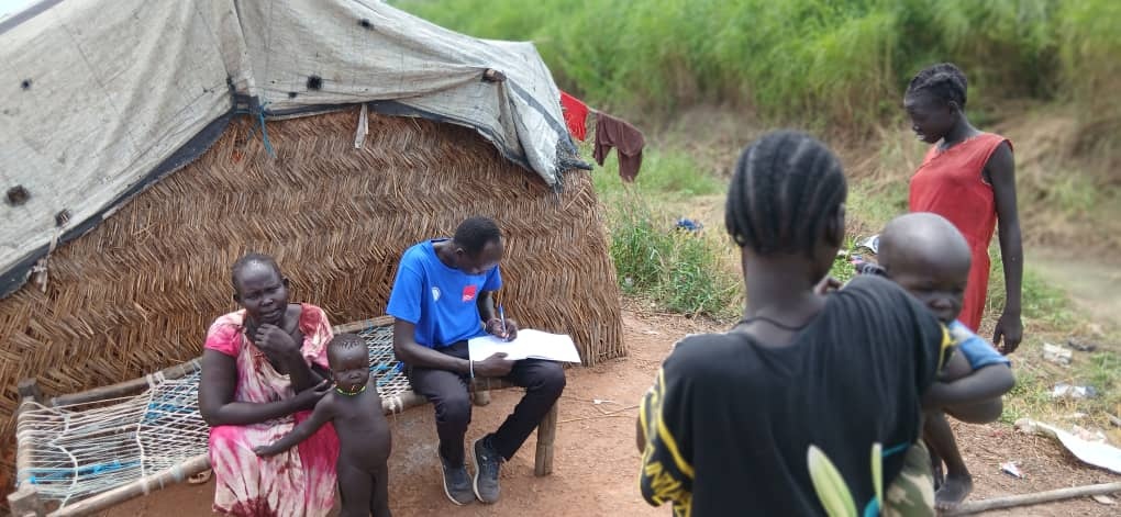Community members receiving humanitarian assistance