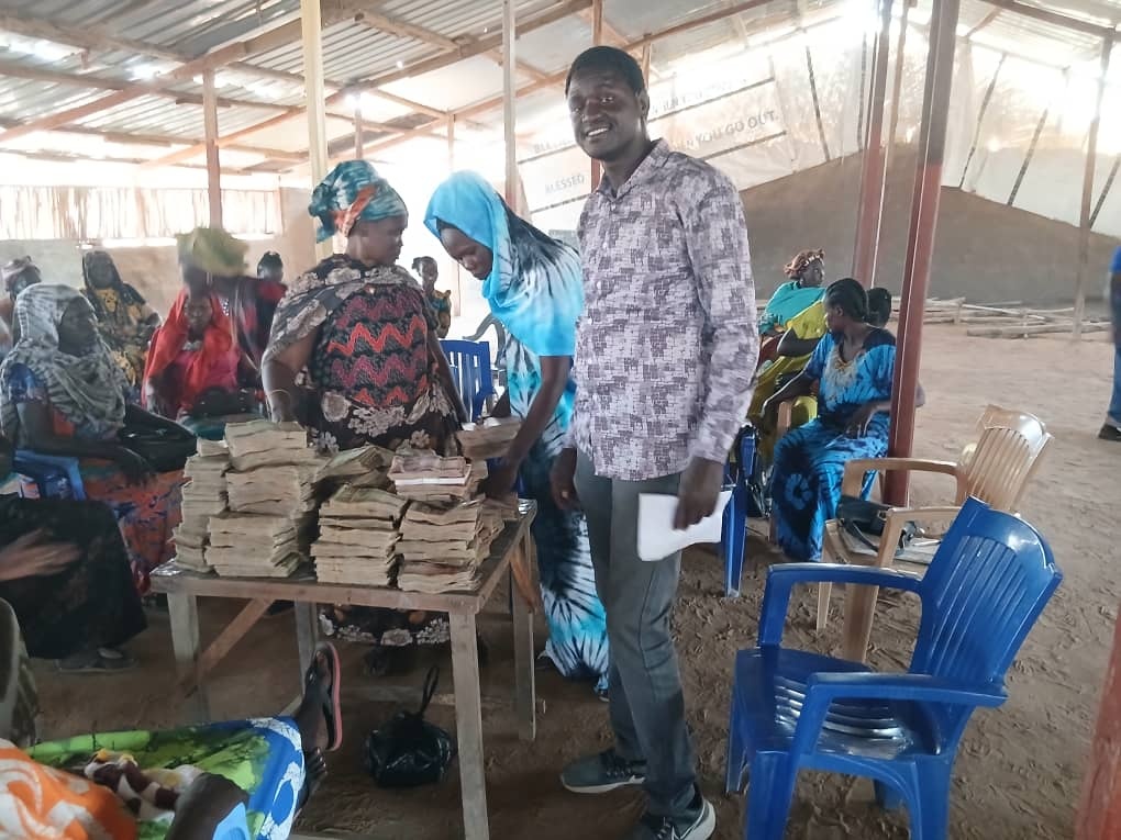 Women participating in a community savings and lending activity